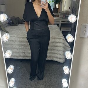 Bebe New Elegant Black Jumpsuit size Large new with tags